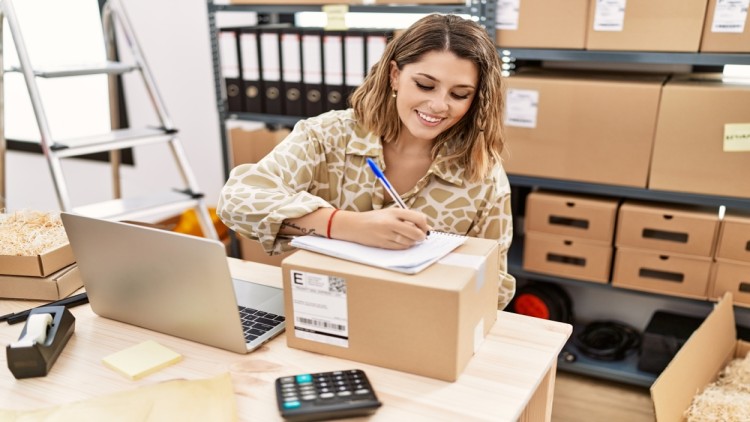 Woman Is Smiling While Working In Warehouse