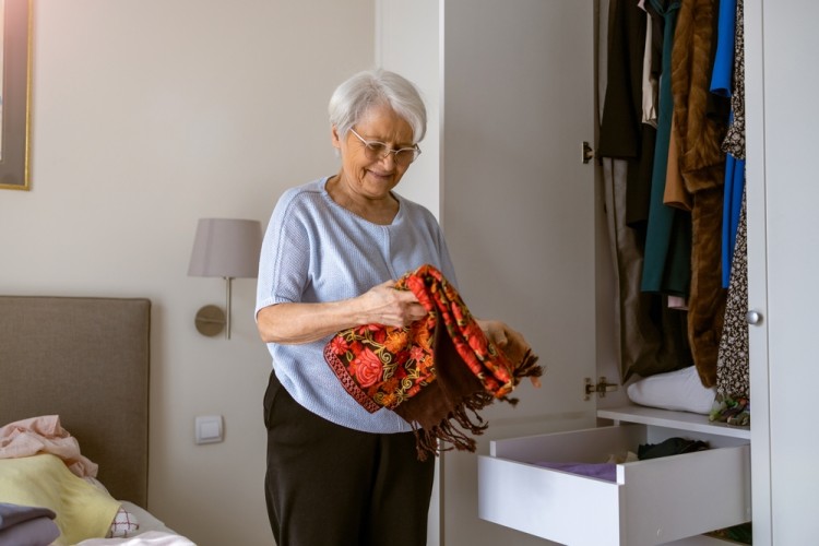 Old Lady Downsizing Her Cloths