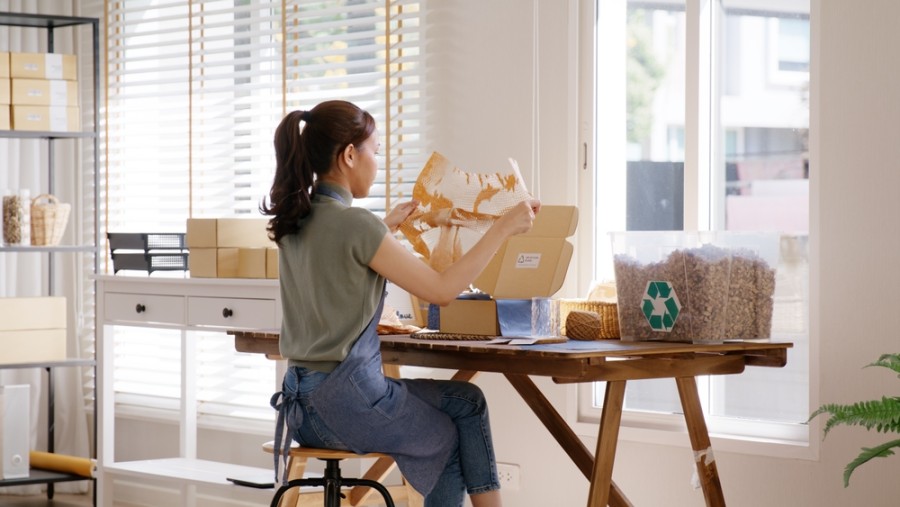 Girl Checking Packaging Material